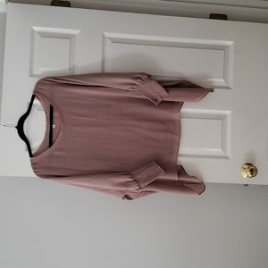 Mauve colored pull over shirt with dolmen sleeves.
